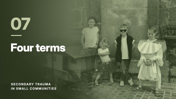Four children against a stone wall, blended with a hillside village in fog, in a moss green tone. Text: “07 Four terms”, Secondary Trauma in Small Communities.