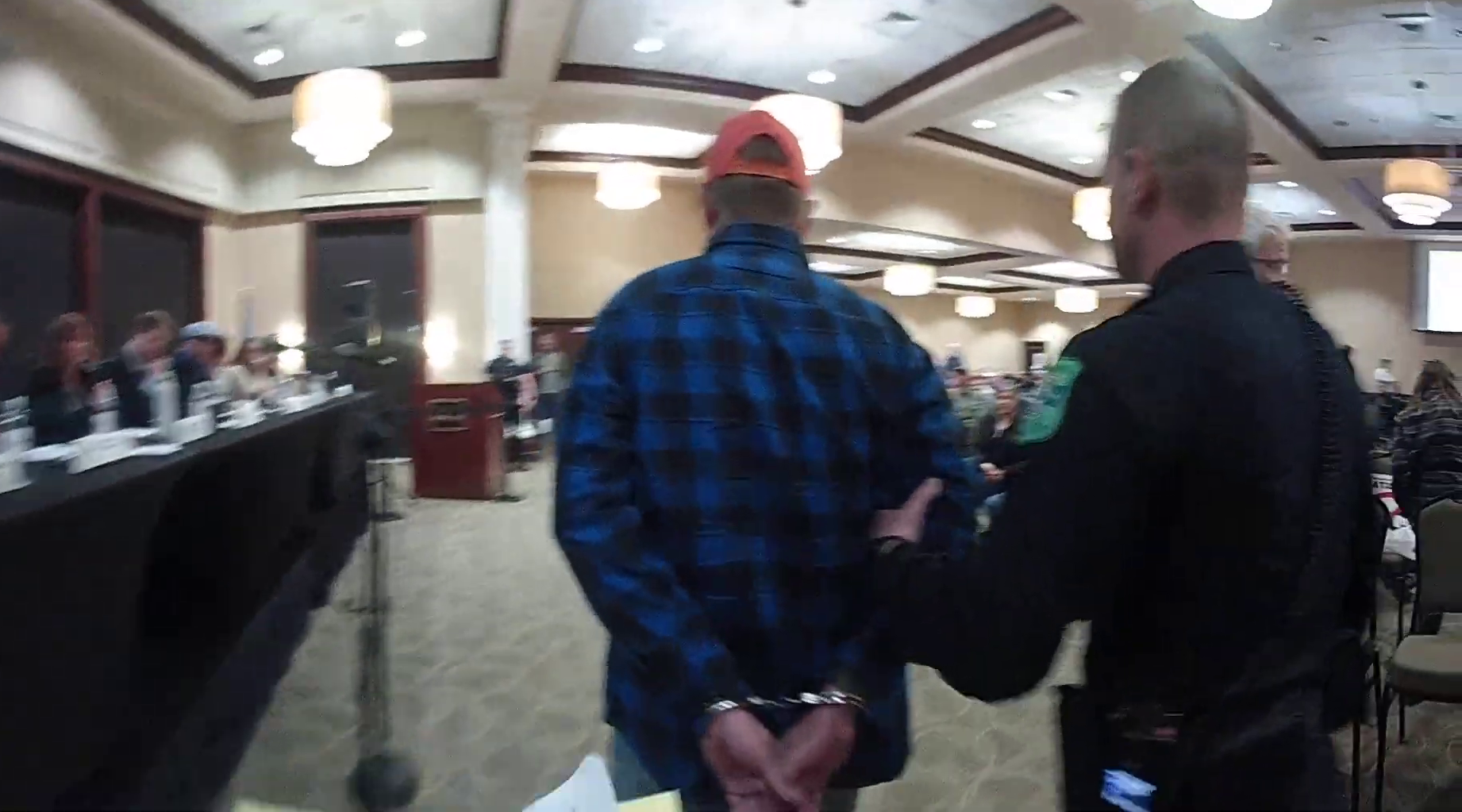 Bodycam Shows Moment Cops Arrested a Man for Speaking Too Long at Data Center Meeting