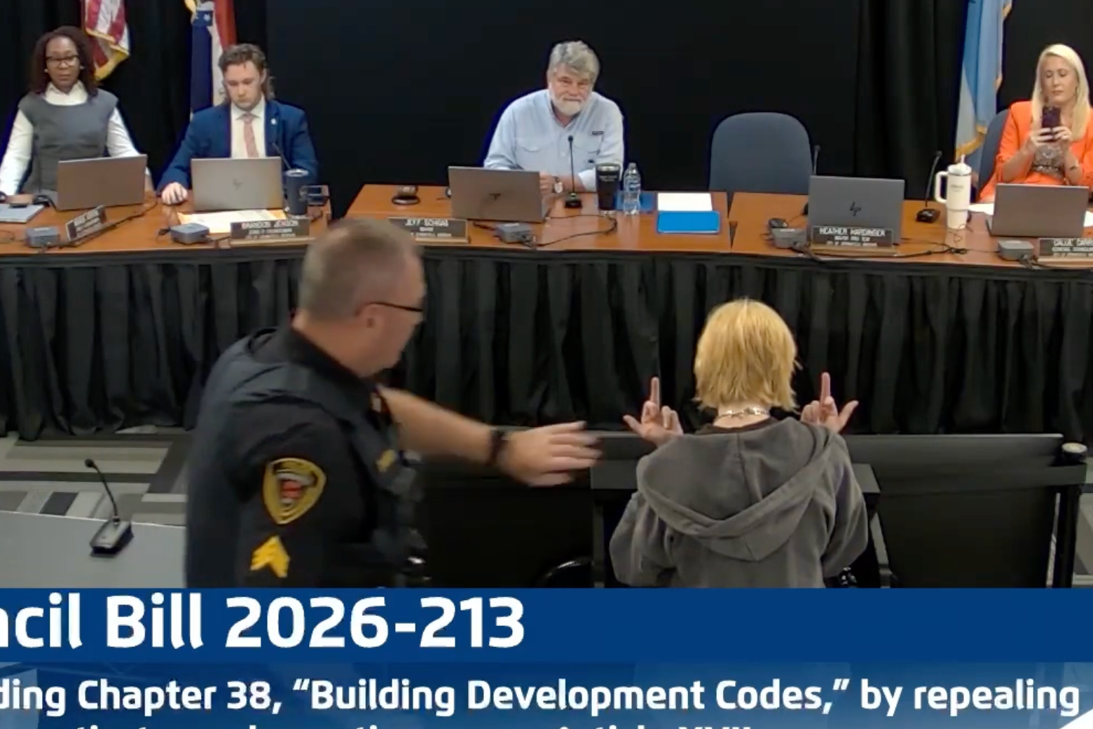 Woman Arrested After City Council Denies Residents Right to Speak on Flock Cameras