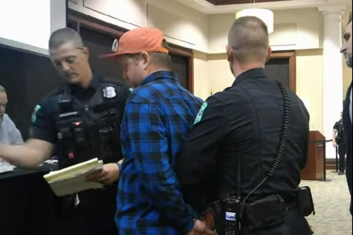 https://www.404media.co/man-opposing-data-center-arrested-for-speaking-slightly-too-long/ social preview image
