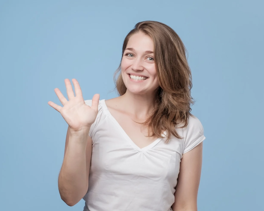 woman waving