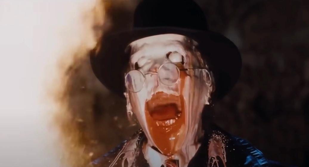 A person with white paint on his face
AI-generated content may be incorrect.