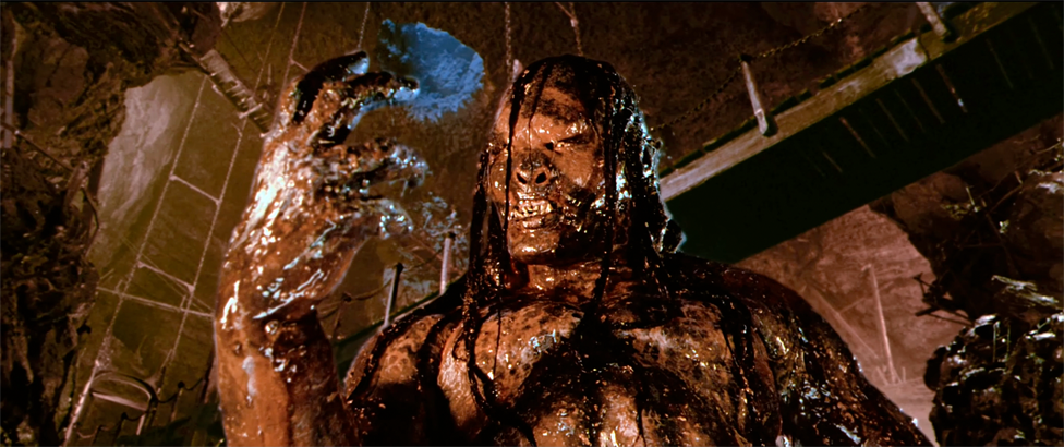 A person with long hair and a body covered in liquid

AI-generated content may be incorrect.