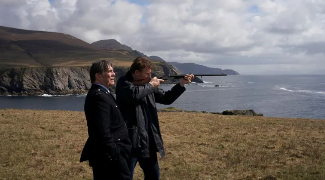 Still from In The Land of Saints and Sinners