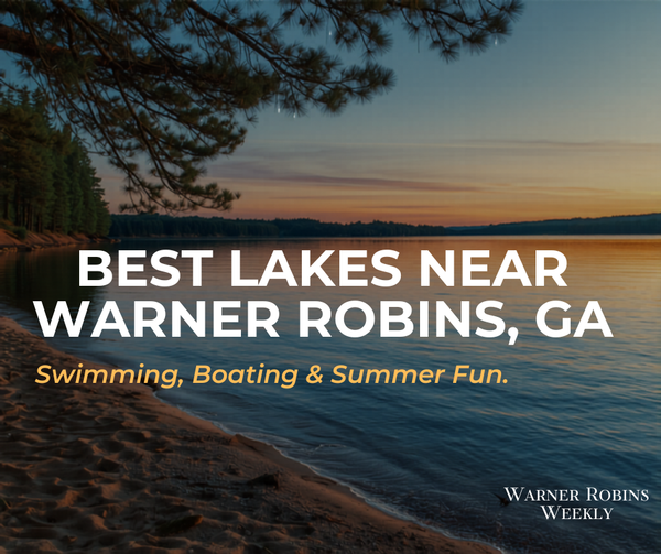 Lake at golden hour with sandy beach and pine trees — best lakes near Warner Robins, GA