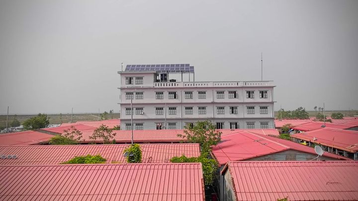 Bhasan Char. Administrative building rises above rows of refugee accommodation. 