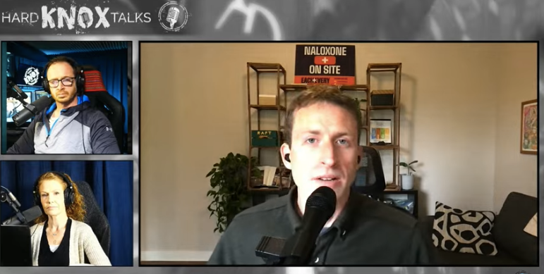 Three people speaking onscreen in a video chat with microphones. 
