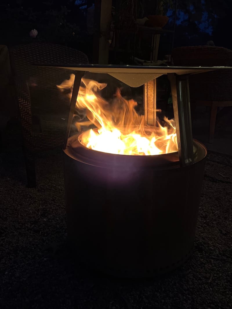 a bunch of hard wood burning bright into the night