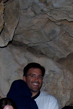 from a picture of a group of people in a cave - that's greg in the back holding his youngest