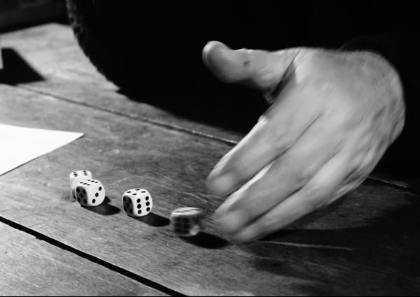 You roll the dice you take your chances (pic of hand rolling dice)