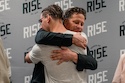 RISE graduate hugging his father