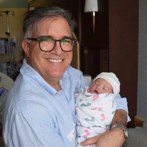 Greg with his brand new grandson