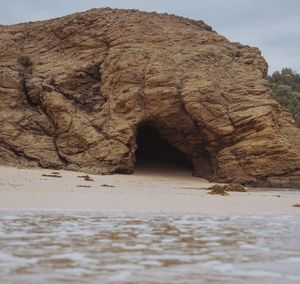 entrance to a cave viewed from the water