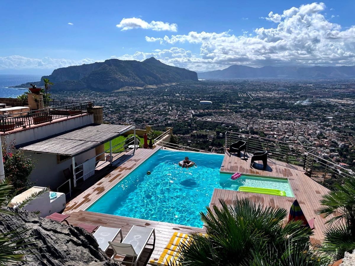 Infinity pool overlooking Palermo and the mountains from our house in Sicily.