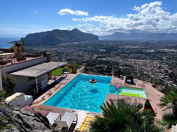 Infinity pool overlooking Palermo and the mountains from our house in Sicily.