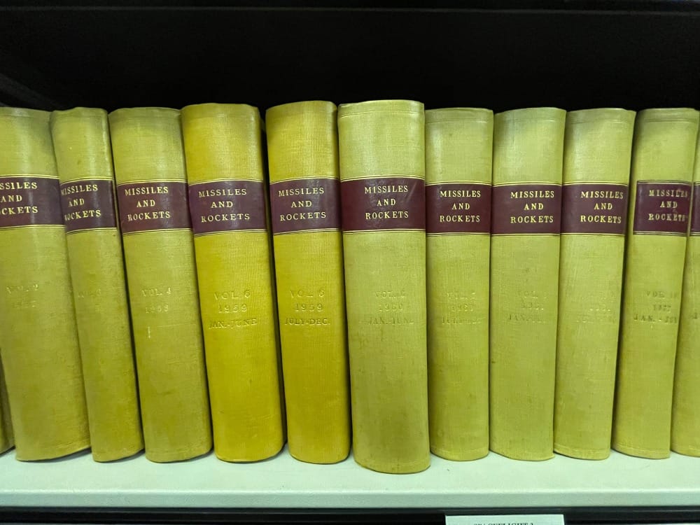 A row of books about missiles and rockets