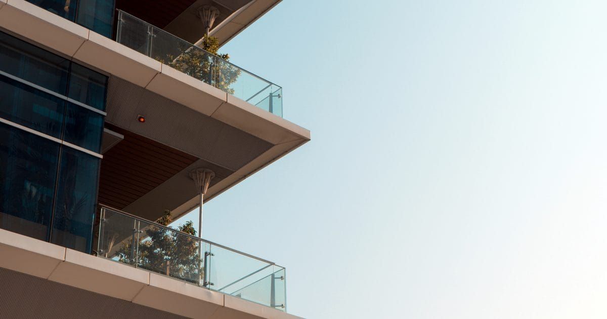 White and brown concrete apartment building