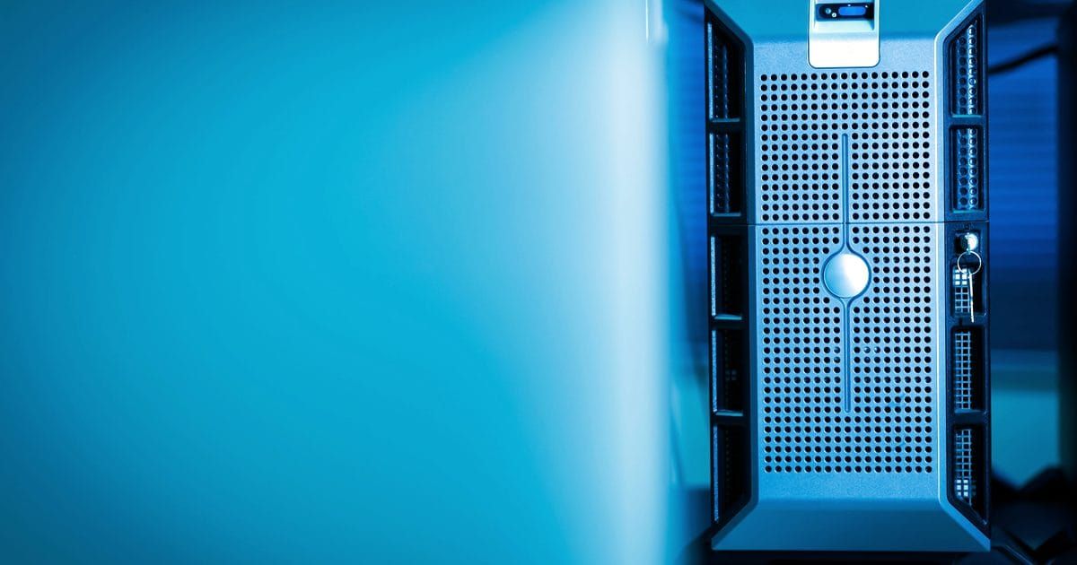 Computer server in a data center lit in blue