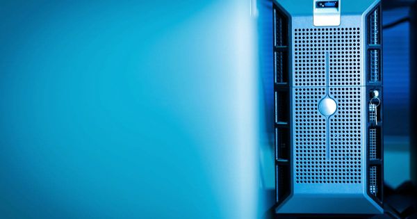 Computer server in a data center lit in blue