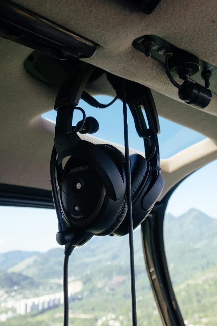 A noise-cancelling (active noise reduction) aviation headset in the cockpit of a Robinson helicopter