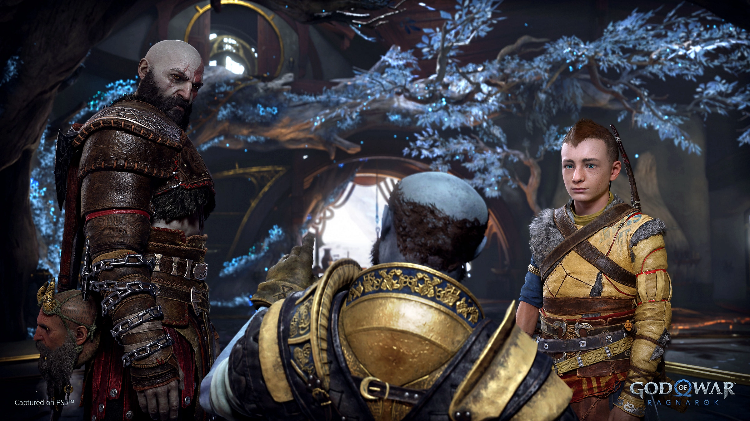 God of War Ragnarök screenshot showing Kratos and Atreus confronting man, tree in background