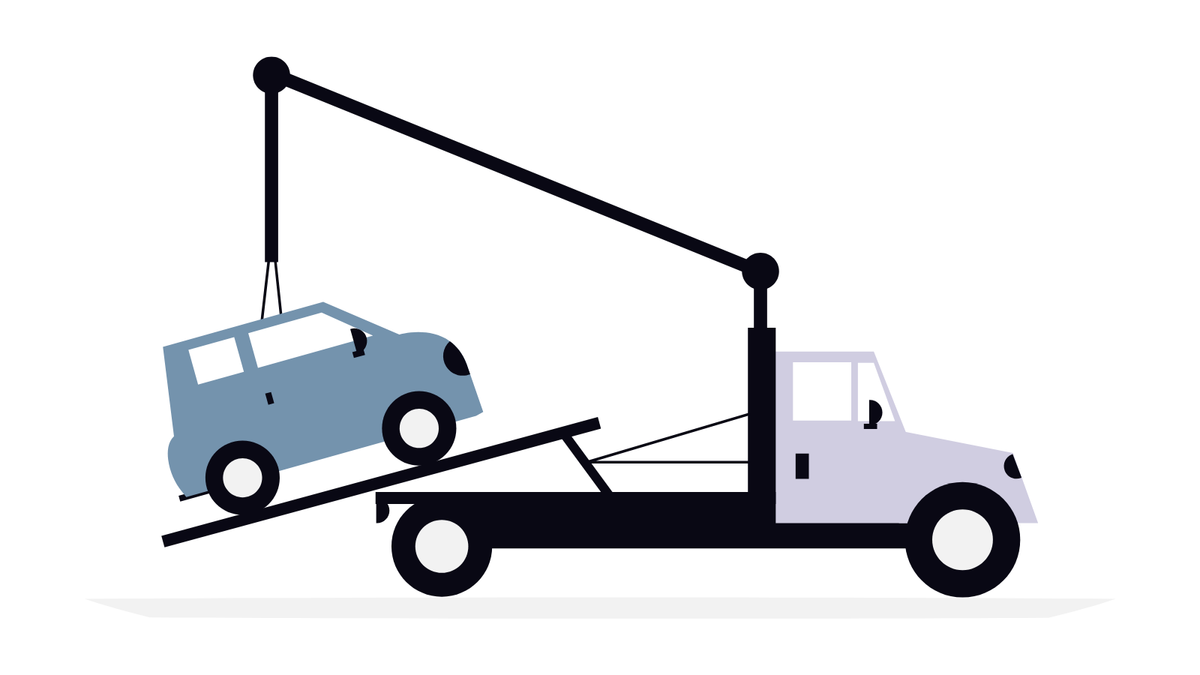 Car being loaded onto a tow truck
