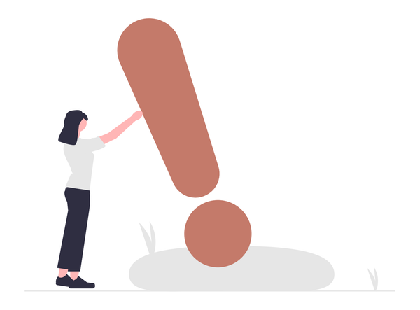 Woman pushing a large exclamation point into an upright position