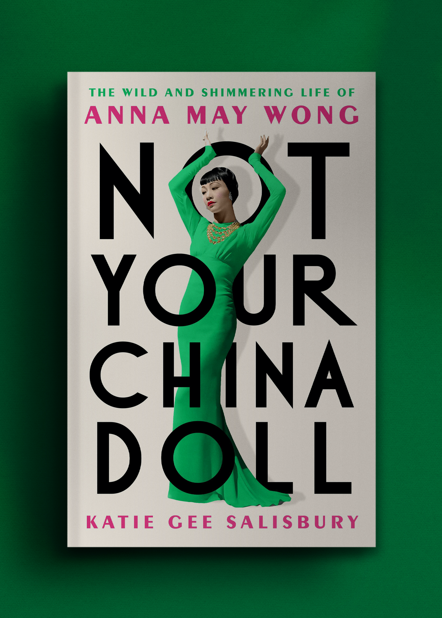 Book cover titled "Not Your China Doll" by Katie Gee Salisbury, features a woman in a green dress with arms raised, set against a green background.
