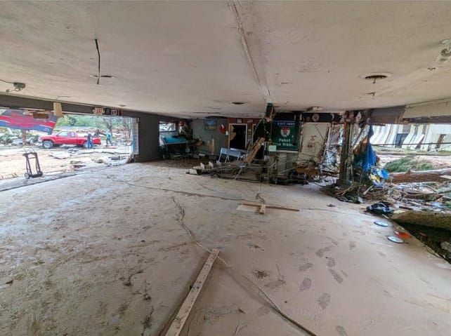 Remains of the Root Bar, Asheville NC; just a bare concrete floor and ceiling