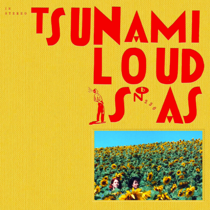 Cover design for Tsunami's 'Loud Is As' features photo of Toomey and Thomson in a field of tall sunflowers inset against a bright yellow knit sweater pattern and tomato-red stylized lettering
