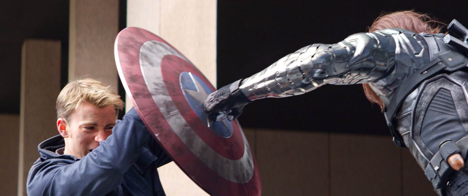 Winter Soldier uses metal arm to Punch Capt. America who blocks with shield you can't make this shit up