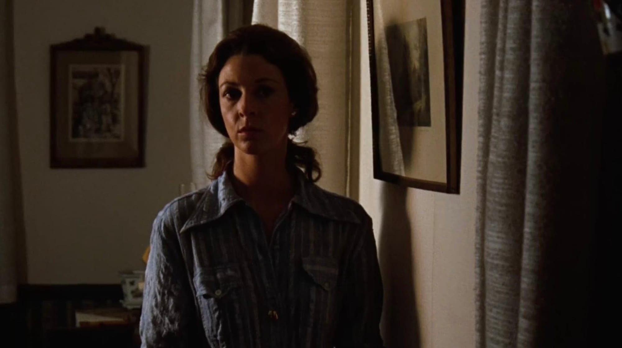 The fearful Judy Hoback Miller in her house, disinclined to tell, but she did