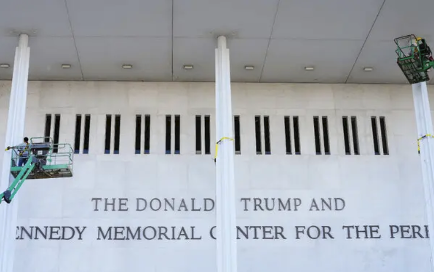 Facade of the Kennedy Center bearing new (mismatched and very poorly set) letters spelling out THE DONALD J. TRUMP AND avoe the original lettering