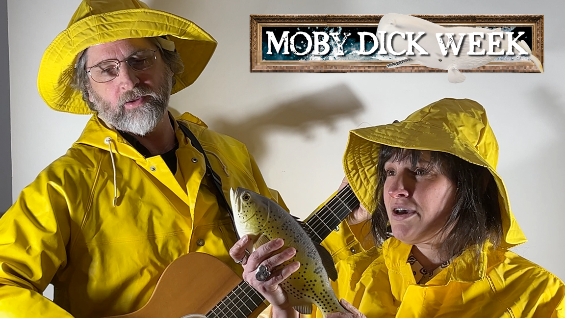 Handsome seafaring duo in yellow foul-weather gear performing a rousing Sea Shanty