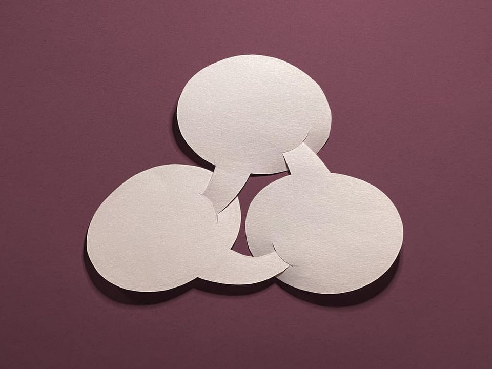 a paper collage depicting three lasciviously intertwined speech balloons
