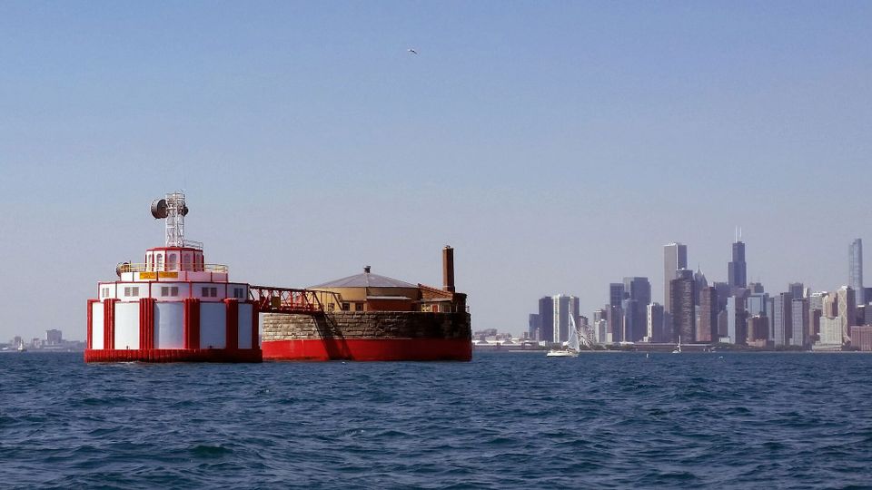 William Dever water intake crib (left) and Carter Harrison water intake crib (right); downtown Chicago in the background