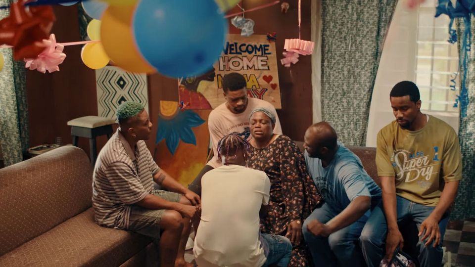 Screenshot from official trailer of A Tribe Called Judah, with Funke Akindele surrounded by her five sons