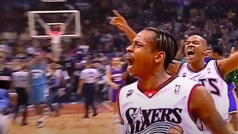 Allen Iverson, jubilant, at the end of the 2001 NBA All-Star Game; young and fierce and shouting