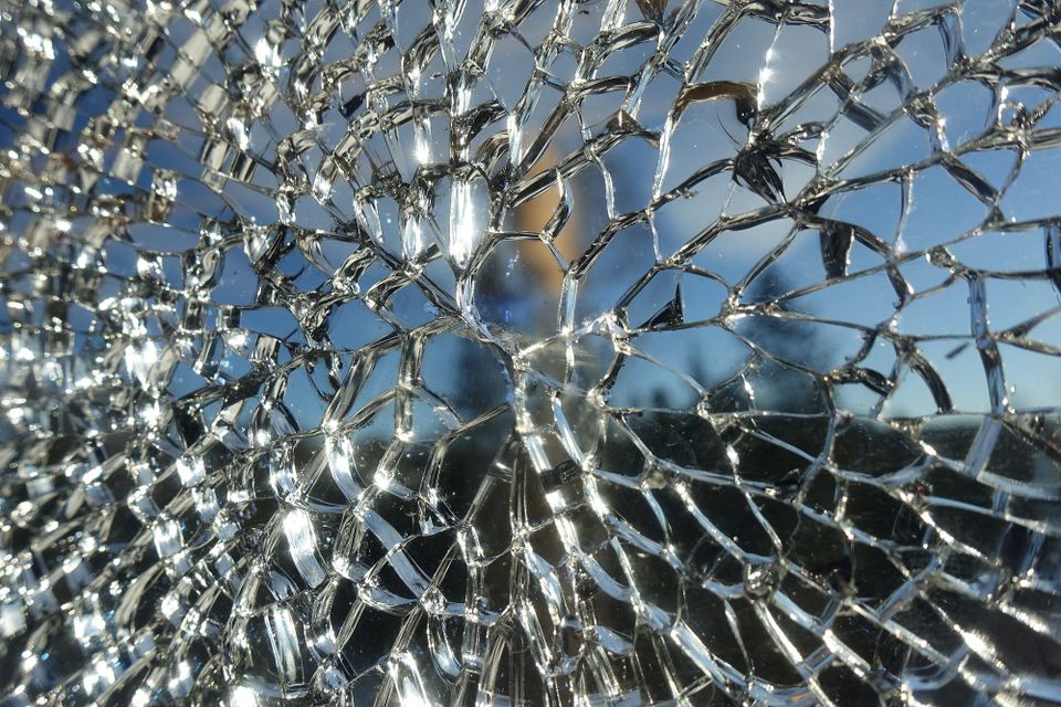 Sunlight through a shattered glass windscreen