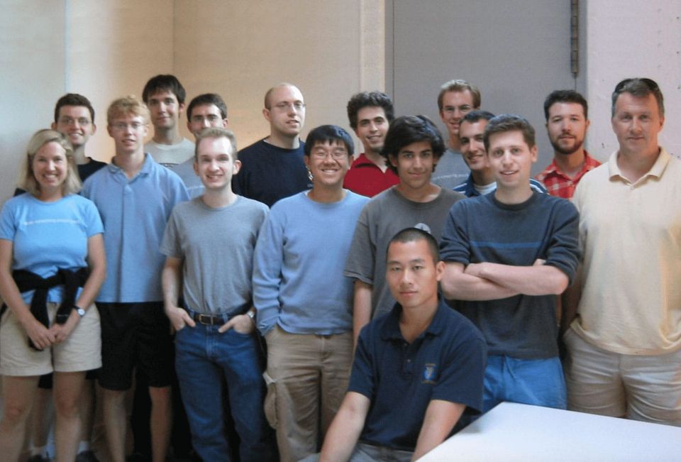Paul Graham (far right) and Jessica Livingston (far left) pose with the inaugural YCombinator batch of 2005
