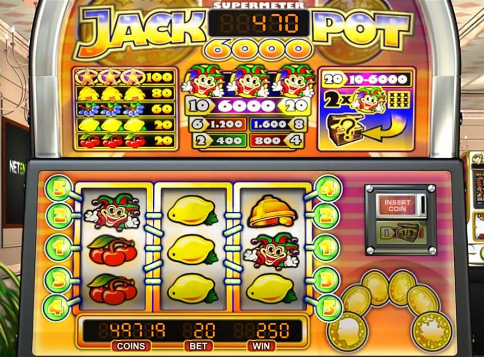 SUPERMETER JACKPOT 6000 slot machine,Joker-lemon-cherry. INSERT COIN slot, digital counter COINS, BET, WIN.