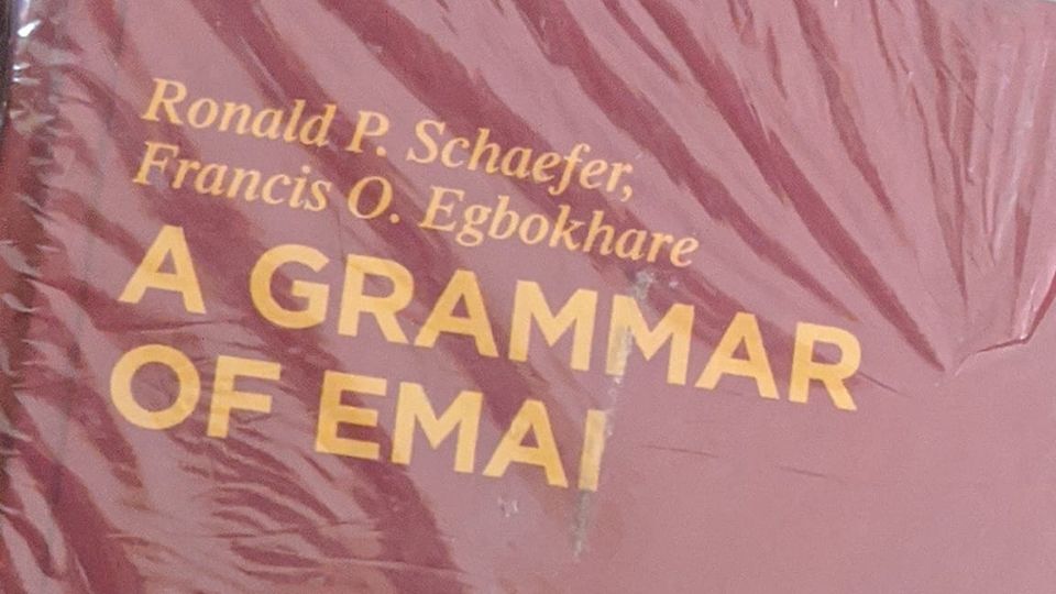 Detail of the plastic-wrapped cover of 'A Grammar of Emai' by Ronald P. Schaefer, Francis O. Egbokhare
