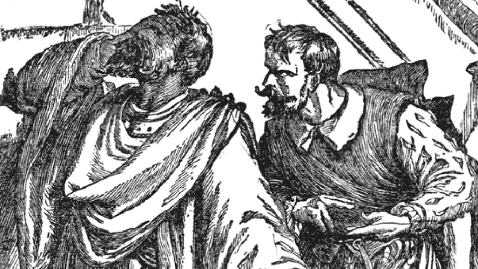 Othelllo  in horror as Iago looks cruelly on