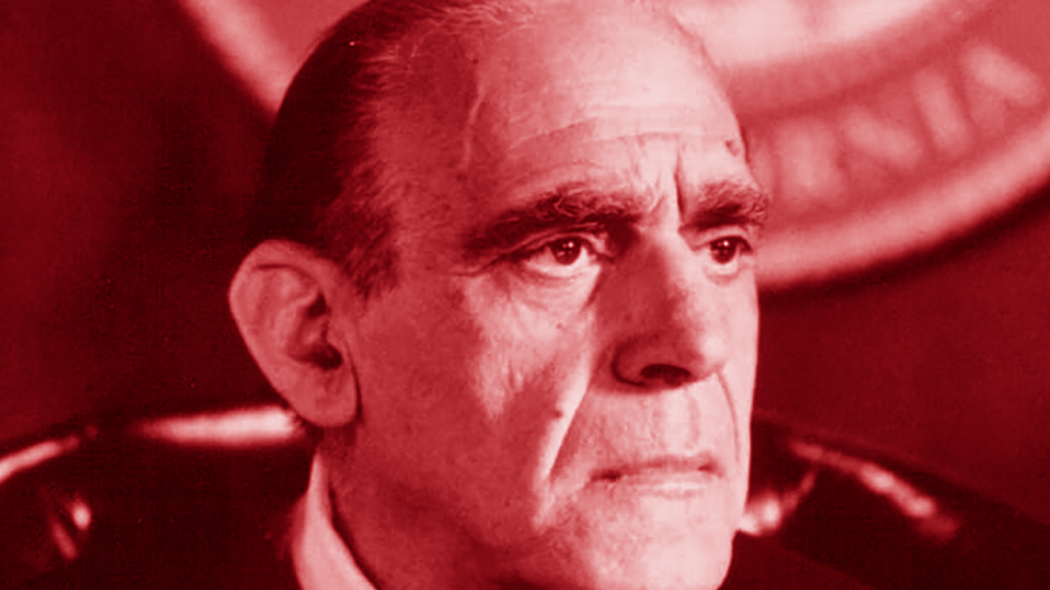 Abe with his hair combed back, looking serious in his role as a judge.