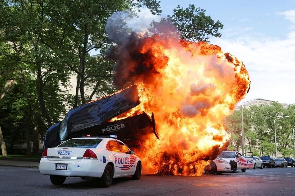 Cop cars gettin' blowed up real good