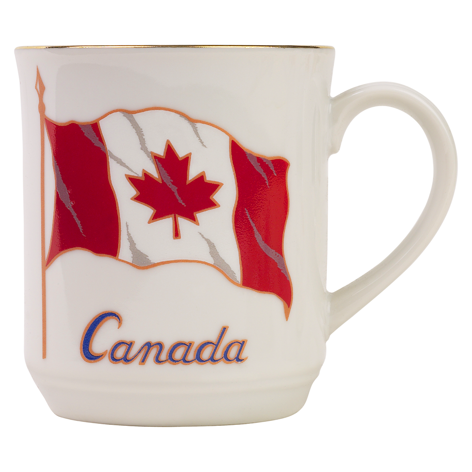 A coffee mug with image of Canadian flag and CANADA in script