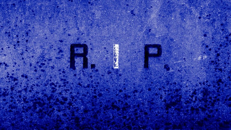 Grave marker: R.I.P. with the "I" emphasized.