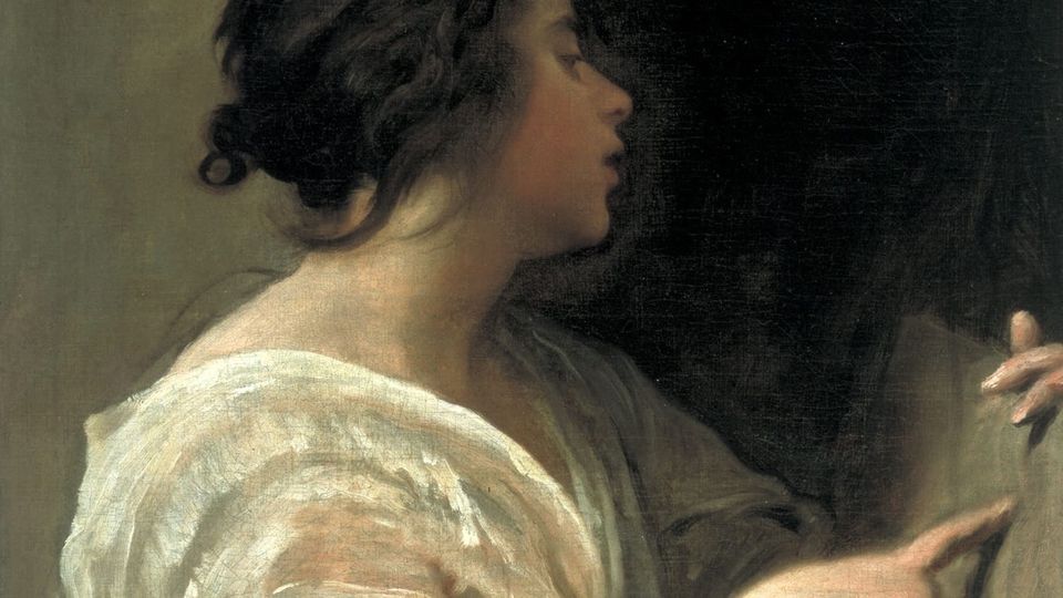 A young woman using fingers to mark tabula