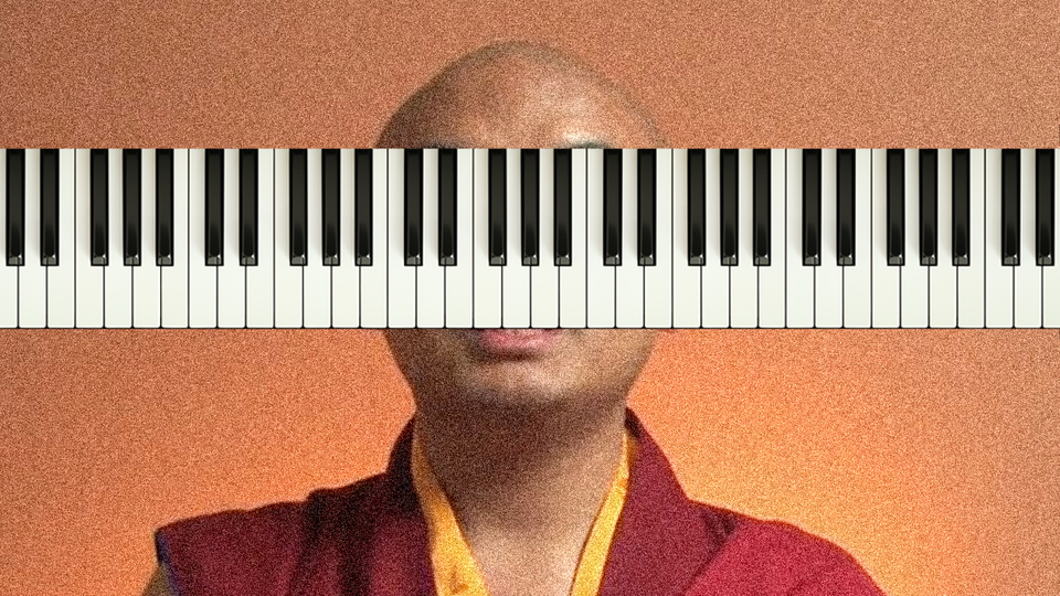 Monk from YouTube with piano keyboard interrupting their gaze