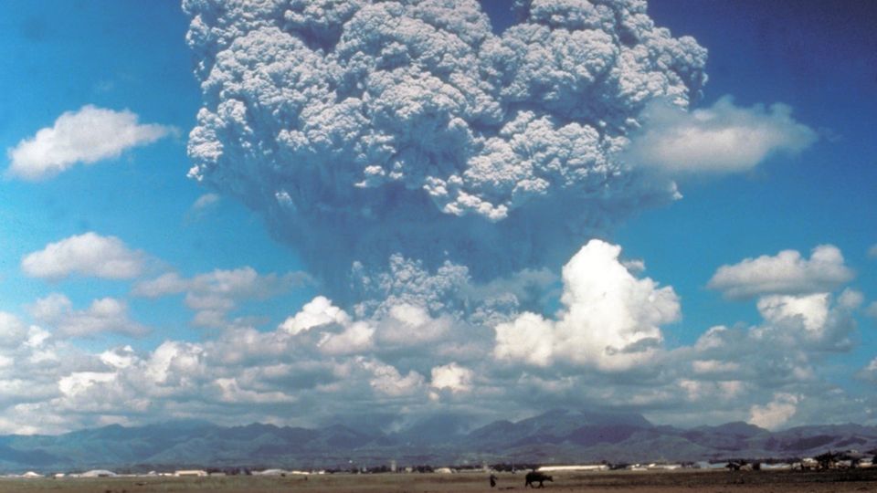 June 12, 1991 eruption column from Mount Pinatubo taken from the east side of Clark Air Base. Breathtakingly huge, mountain-dwarfing, a cosmic broccoli of smoke and ash